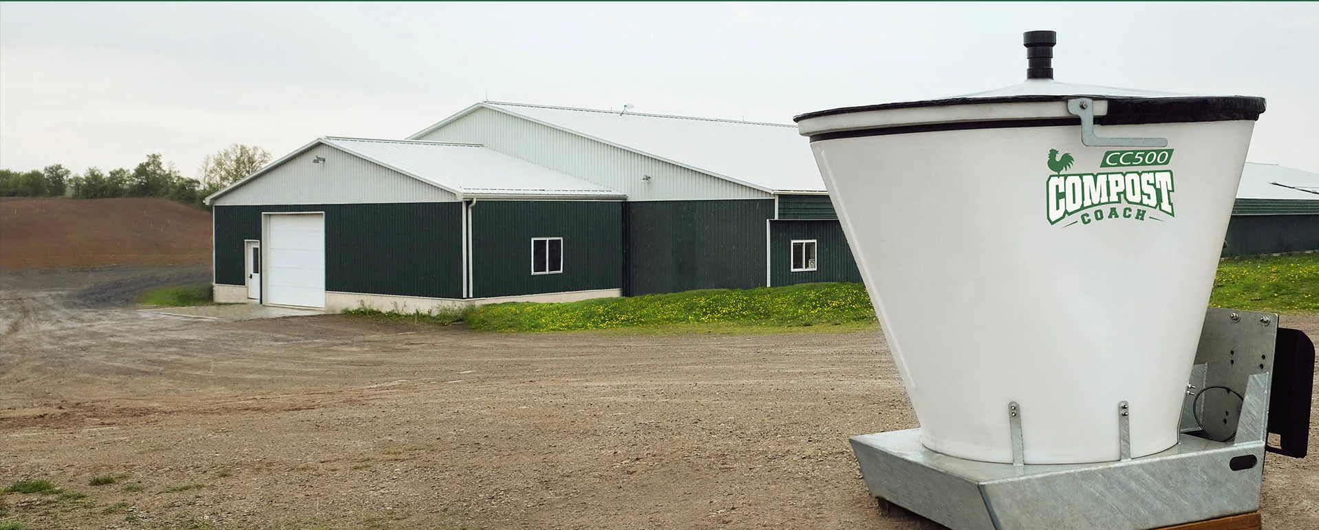 CC500 Compost Coach composter outside an Ontario poultry barn